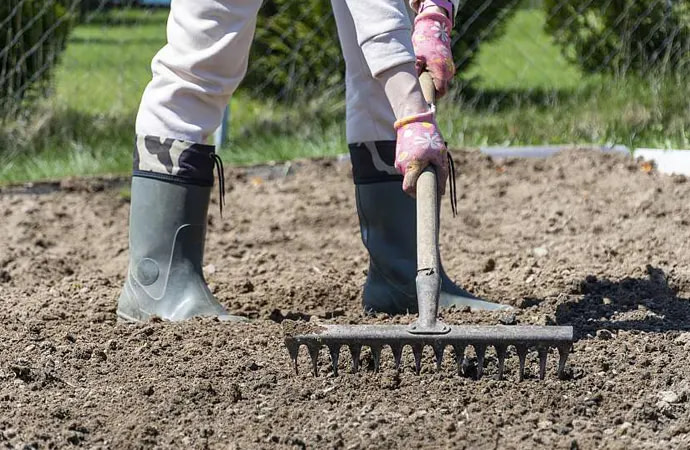 Garden rakes serve a number of purposes, particularly to brush together cut grass or break up clumped soil and remove stones.